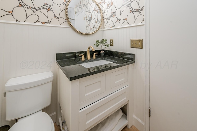 half bath with toilet and vanity