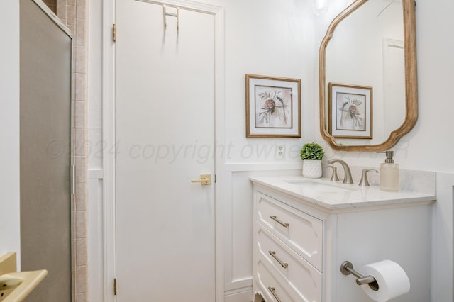 full bathroom featuring an enclosed shower and vanity