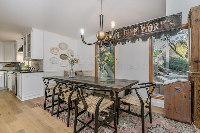 dining room with light wood-type flooring