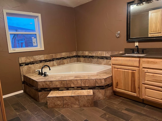 505 S Denton St, Booker, TX 79005 - bathroom featuring vanity and a garden tub