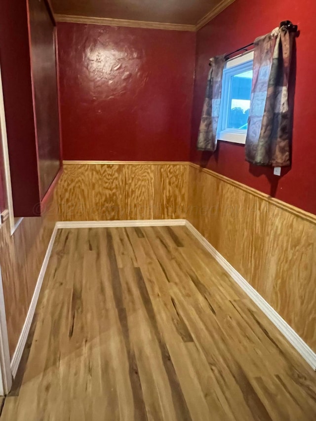 505 S Denton St, Booker, TX 79005 - detailed view of crown molding, wood finished floors, and wainscoting