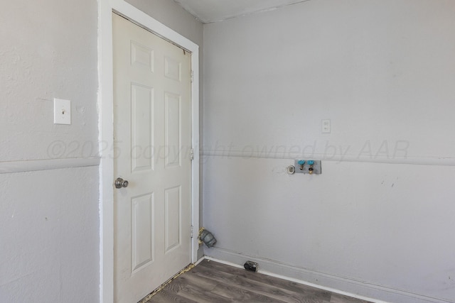 420 N Nelson St, Pampa, TX 79065 - laundry room featuring dark wood-style flooring and laundry area