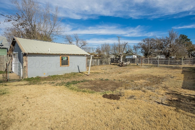 420 N Nelson St, Pampa, TX 79065 - view of yard with a fenced backyard and an outdoor structure