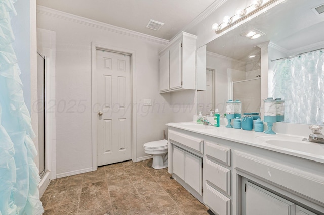 bathroom with a sink, visible vents, a shower stall, and ornamental molding