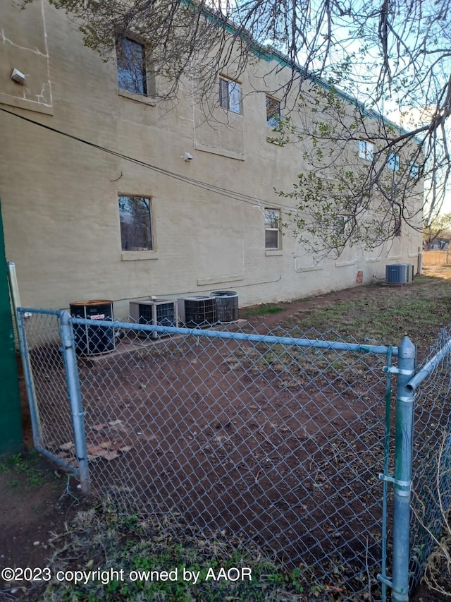 view of home's exterior with central AC unit