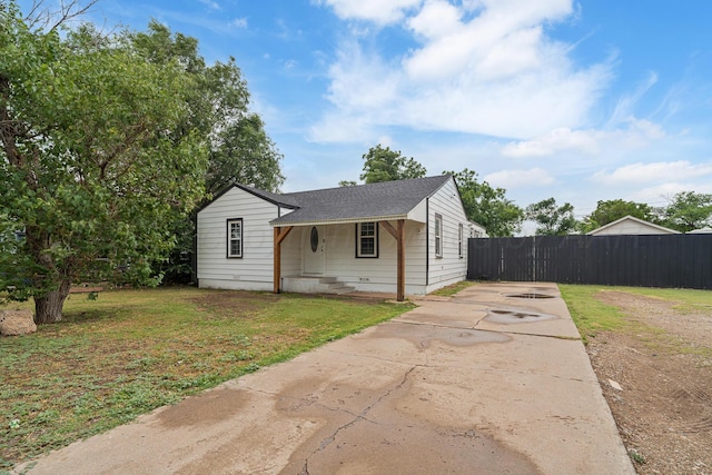 4102 SE 12th Ave, Amarillo, TX 79104 - bungalow with concrete driveway and a shingled roof