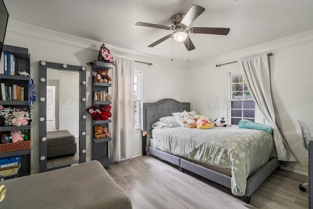 4102 SE 12th Ave, Amarillo, TX 79104 - bedroom with crown molding, wood finished floors, and ceiling fan