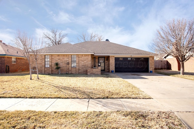 ranch-style home featuring a garage