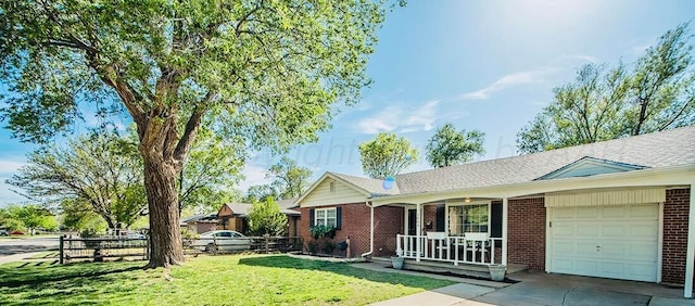 single story home featuring a porch, a garage, fence, and brick siding