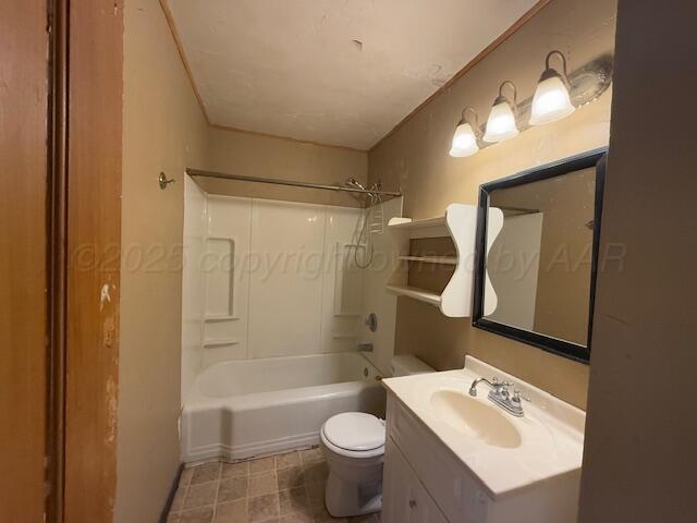 full bathroom featuring vanity, shower / bathtub combination, and toilet