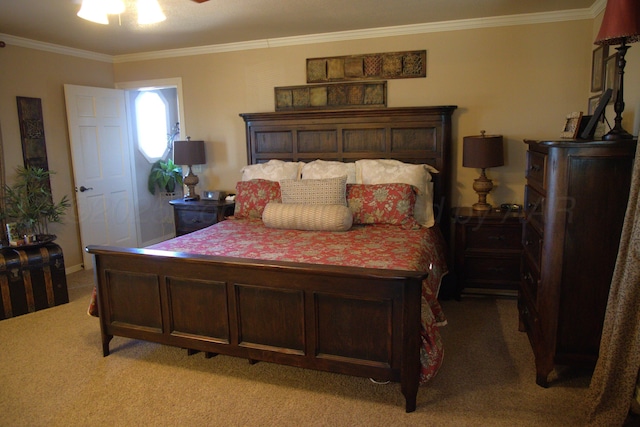 carpeted bedroom with ornamental molding