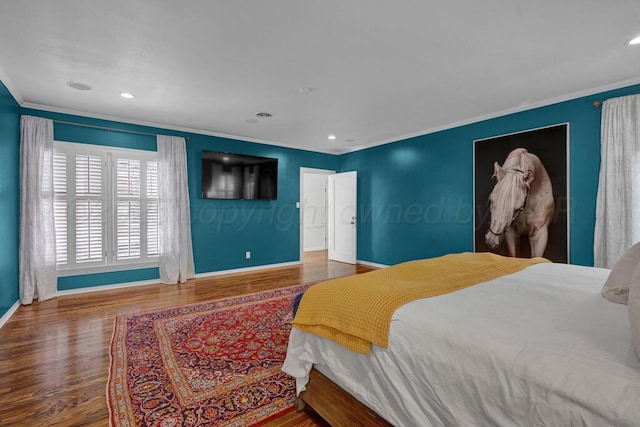 2411 S Lipscomb St, Amarillo, TX 79109 - bedroom with ornamental molding, baseboards, wood finished floors, and recessed lighting