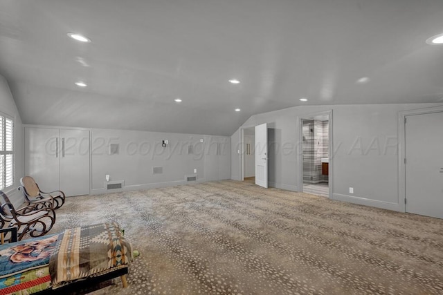 2411 S Lipscomb St, Amarillo, TX 79109 - unfurnished living room with carpet floors, vaulted ceiling, recessed lighting, and baseboards