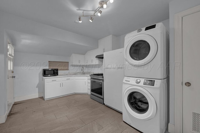 2411 S Lipscomb St, Amarillo, TX 79109 - laundry room with estacked washer and dryer
