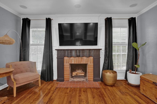 2411 S Lipscomb St, Amarillo, TX 79109 - living area featuring a brick fireplace, crown molding, and wood finished floors