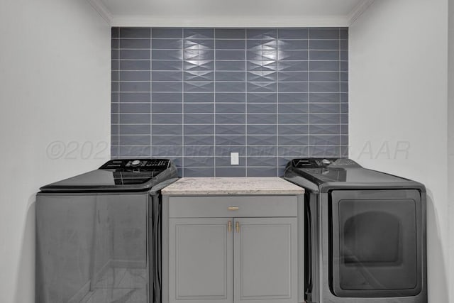 2411 S Lipscomb St, Amarillo, TX 79109 - laundry area featuring separate washer and dryer and cabinet space