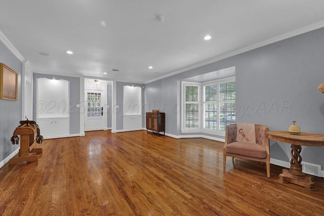 2411 S Lipscomb St, Amarillo, TX 79109 - living area featuring ornamental molding, wood finished floors, baseboards, and recessed lighting