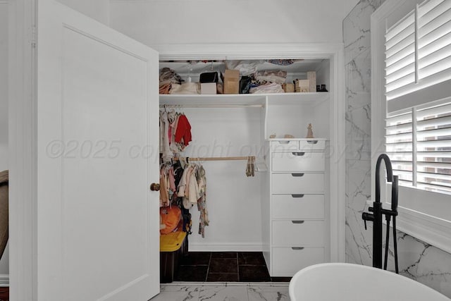 2411 S Lipscomb St, Amarillo, TX 79109 - bathroom with marble finish flooring and a freestanding bath
