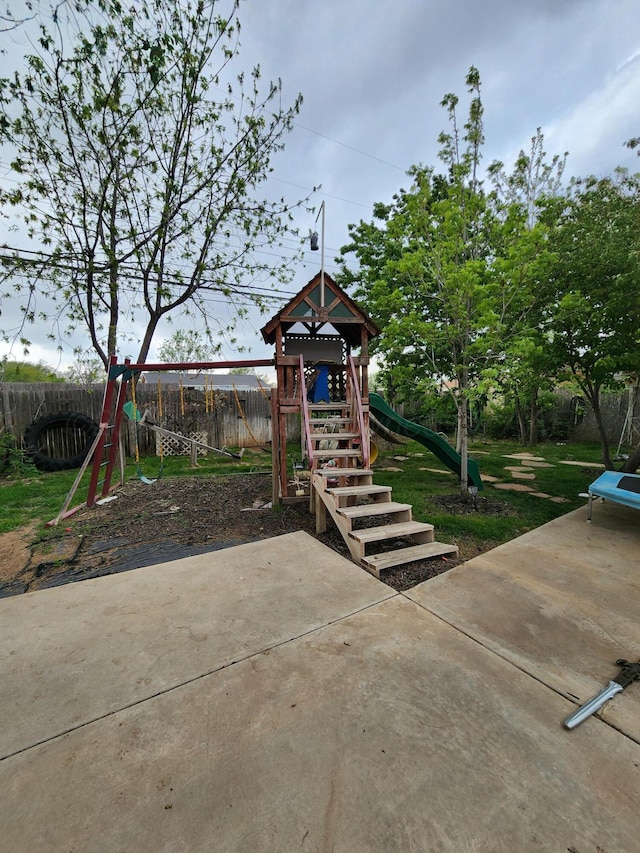 view of play area featuring a patio and fence