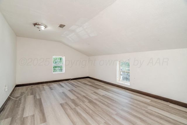 2738 Palm St, Amarillo, TX 79107 - bonus room featuring lofted ceiling and wood finished floors