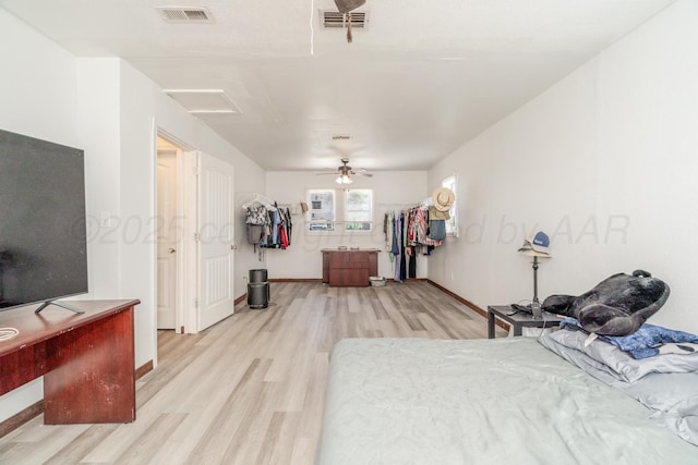 2738 Palm St, Amarillo, TX 79107 - bedroom featuring attic access, light wood-style flooring, and a ceiling fan