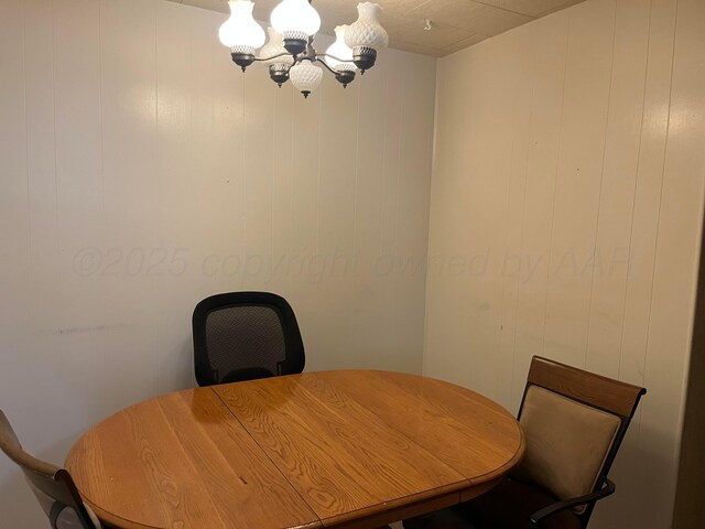 905 Harrington St, Borger, TX 79007 - dining room featuring a chandelier