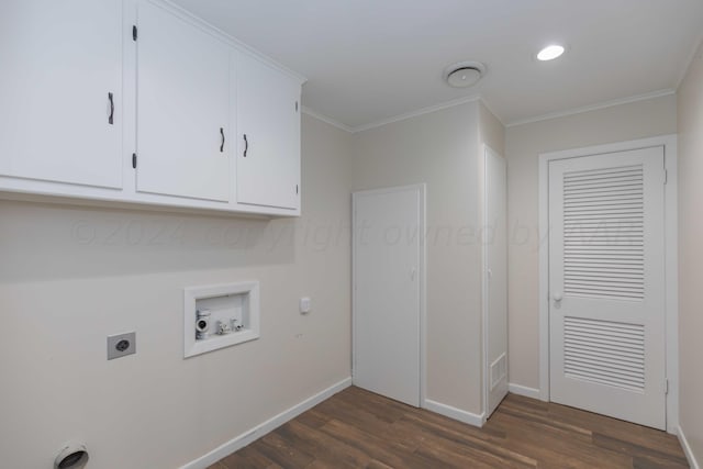 clothes washing area featuring hookup for an electric dryer, dark hardwood / wood-style flooring, washer hookup, and ornamental molding