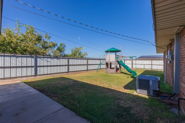 view of yard with a playground and cooling unit