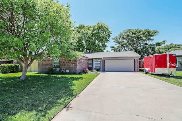 2904 Pittsburg St, Amarillo, TX 79103 - view of front of house featuring brick siding, driveway, a front lawn, and an attached garage