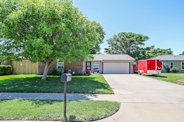 2904 Pittsburg St, Amarillo, TX 79103 - view of front of property with an attached garage, brick siding, and driveway