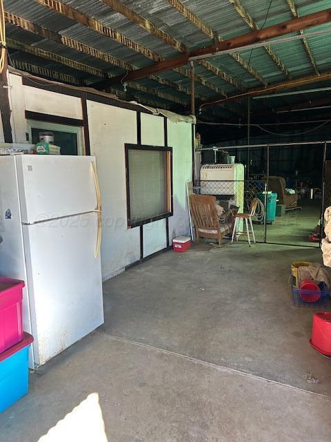 garage featuring white refrigerator