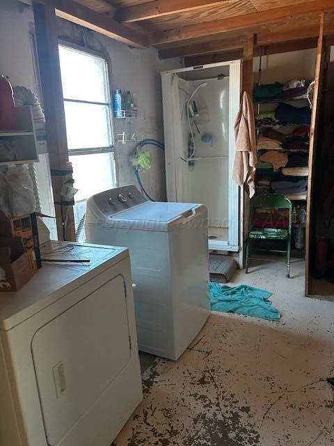 laundry area featuring independent washer and dryer