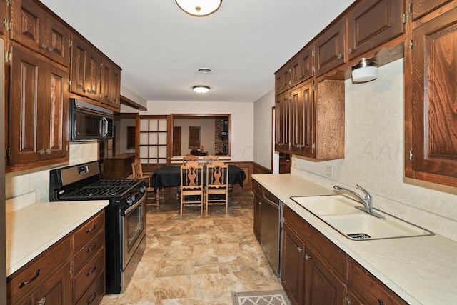 kitchen with appliances with stainless steel finishes and sink