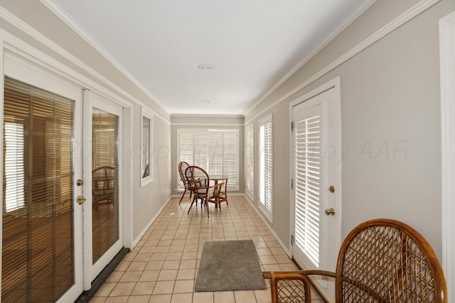 sunroom / solarium featuring french doors