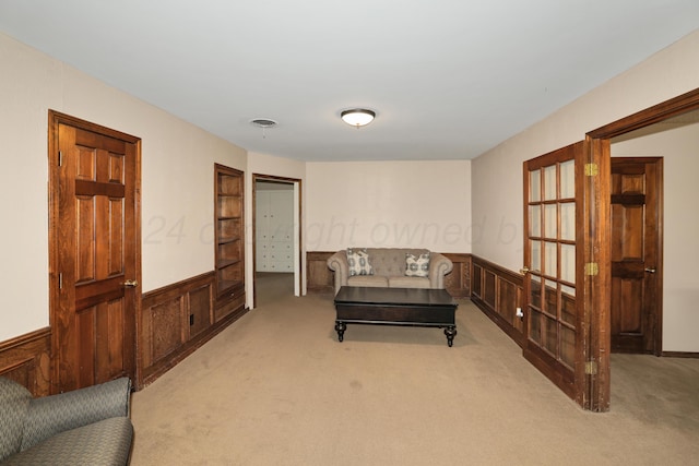 interior space with light colored carpet