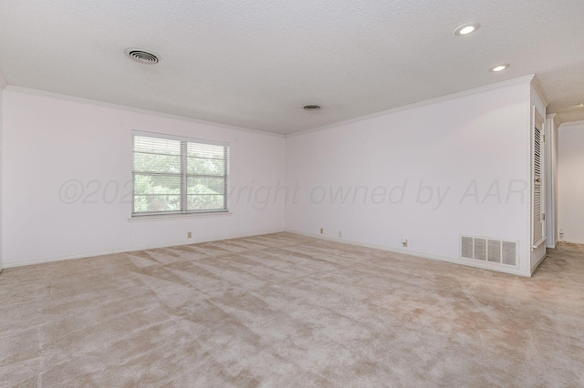 unfurnished room featuring ornamental molding, carpet, recessed lighting, baseboards, and a textured ceiling