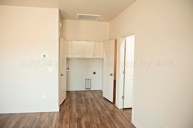 hall with dark wood-type flooring