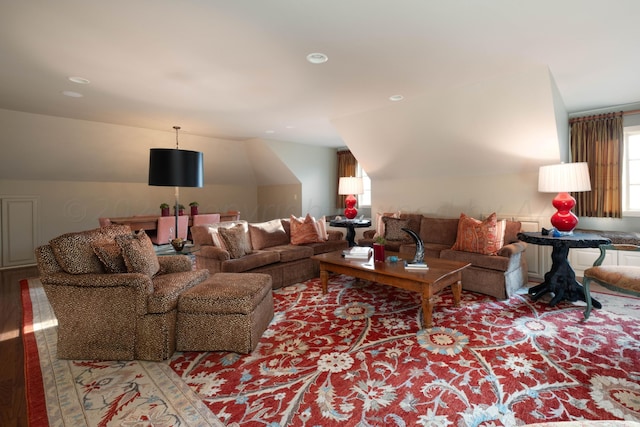 living room with lofted ceiling