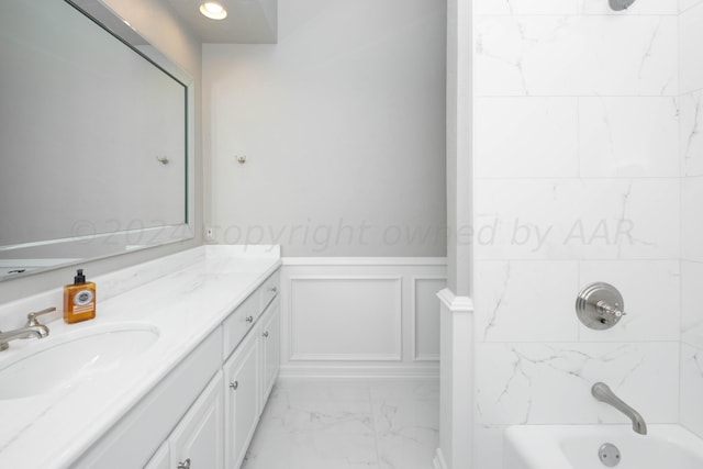 bathroom featuring plus walk in shower and vanity