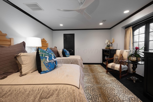 bedroom with carpet flooring, ceiling fan, and crown molding