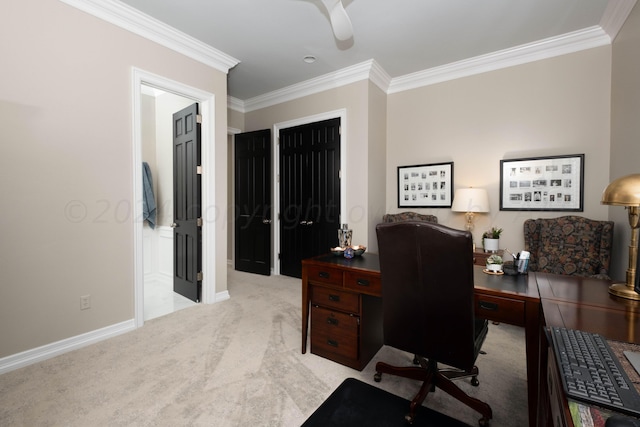 carpeted office space featuring crown molding