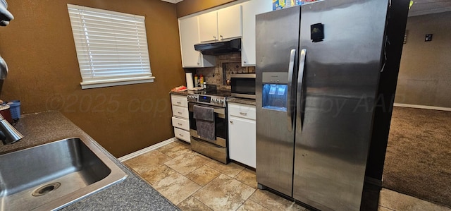 kitchen featuring white cabinetry, appliances with stainless steel finishes, and sink