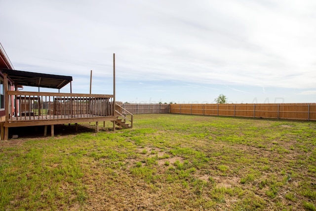 view of yard featuring a wooden deck
