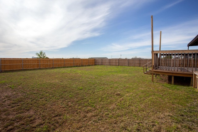 view of yard with a wooden deck