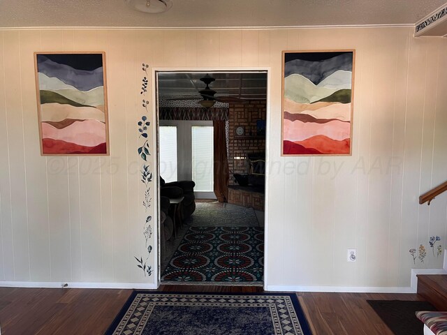 1400 16th St, Hereford, TX 79045 - corridor featuring baseboards, dark wood-style floors, stairs, and crown molding