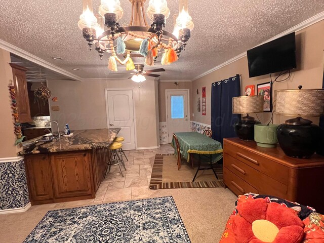 1400 16th St, Hereford, TX 79045 - bedroom with a chandelier, a textured ceiling, a sink, and crown molding