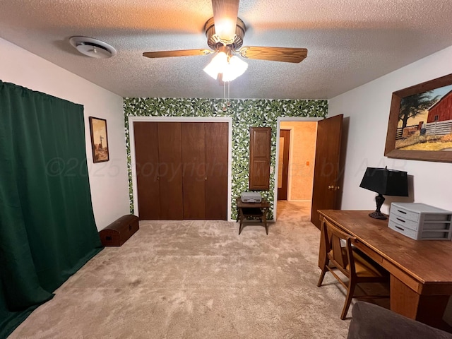 1400 16th St, Hereford, TX 79045 - office featuring ceiling fan, light carpet, and a textured ceiling