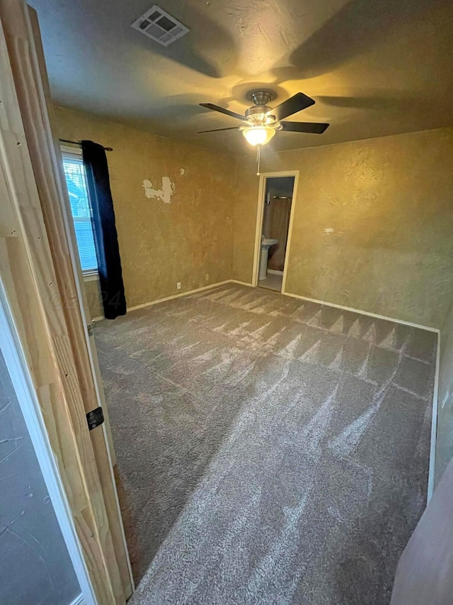 spare room featuring carpet flooring