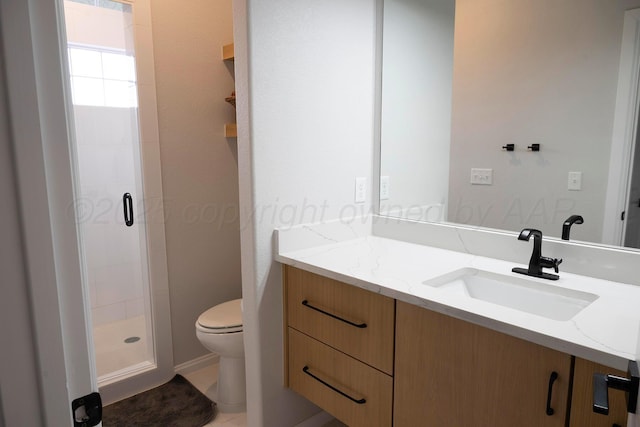 full bath featuring a stall shower, toilet, and vanity