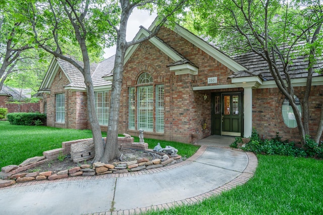 3501 Van Winkle Dr, Amarillo, TX 79121 - view of front of house with brick siding and a front yard